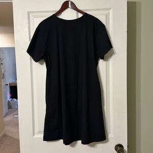 Gently preowned black Bammies shift dress with pockets; size 3 (12) in black.